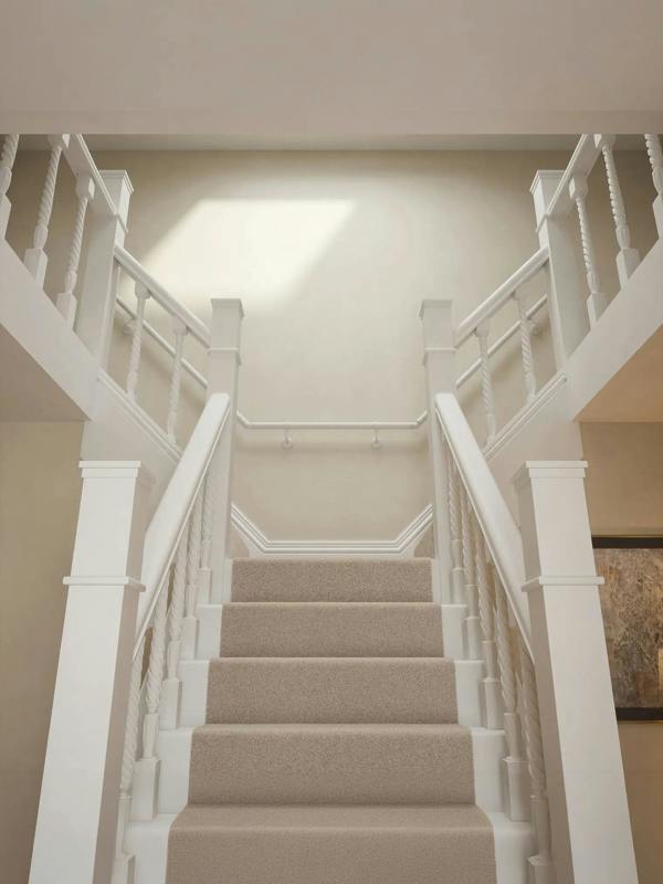 Edstone Matt White wall-mounted handrail fitted on a T-shape staircase, front view – Handrails Direct UK supplier of modular indoor handrails and fittings