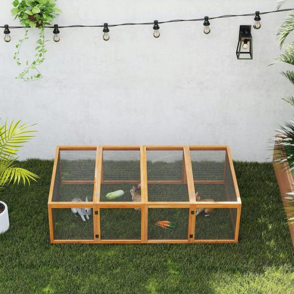 Front view wooden rabbit hutch with wire mesh panels and three door sections