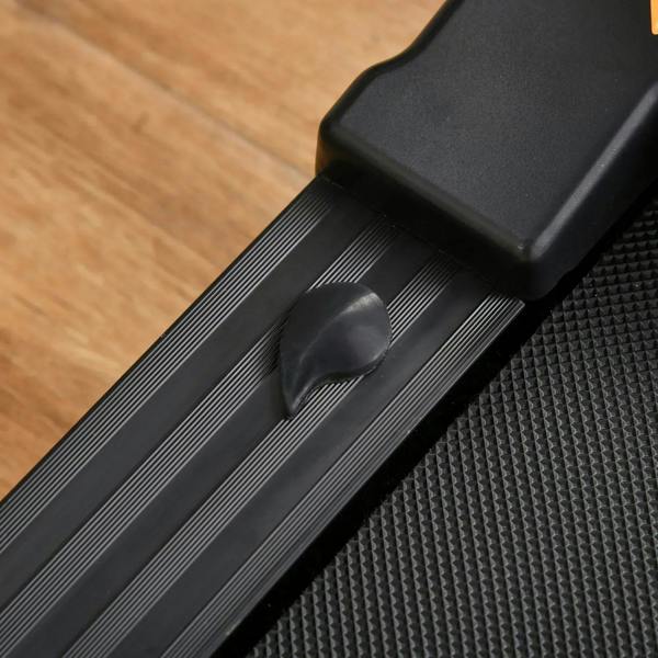 Black treadmill running belt and textured traction surface