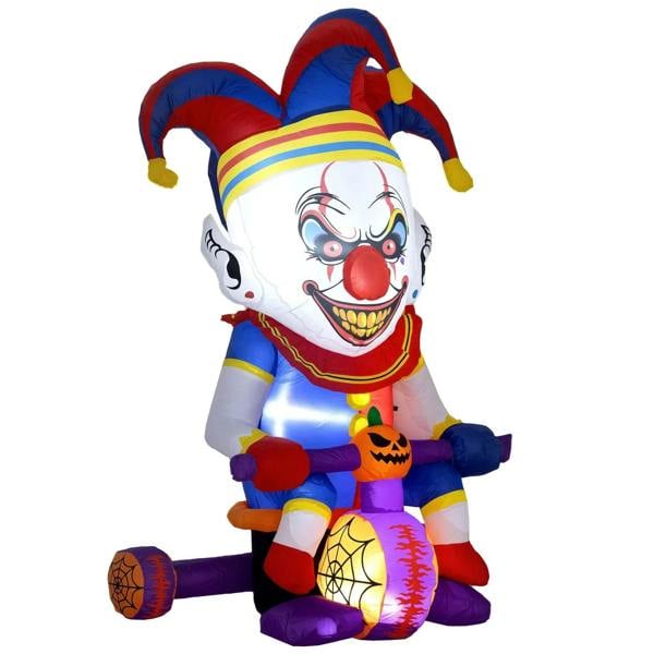 Inflatable Halloween clown decoration in blue, red, and yellow with jack-o'-lantern light