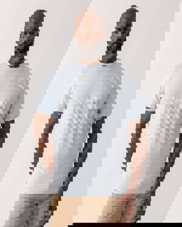 model wearing a Belstaff Surface Mens T-Shirt in Sky Blue