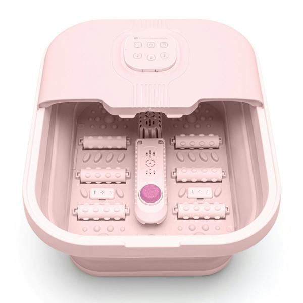Interior view of foot spa with 6 reflexology rollers and built-in pumice stone for exfoliating foot care.