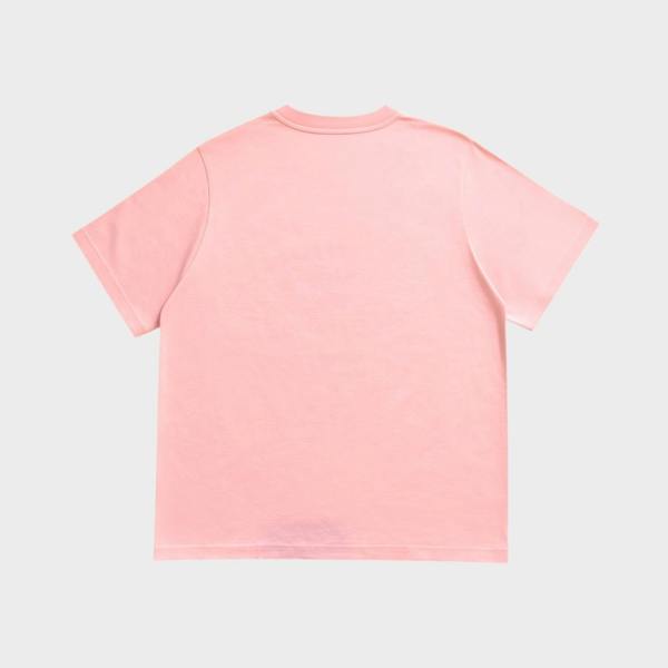 Back view of a Supplied Fashion pink cotton t-shirt with a relaxed fit and clean, minimalist design.