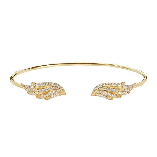 The BLOOMTINE Illuminess™ Angel Wing Bangle in Gold Vermeil. Featuring two intricately carved wings studded with shimmering lab-grown moissanites, this protective talisman bracelet represents the 'Extraordinary Human' spirit in a high-luster gold finish