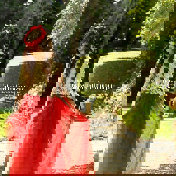 Flower Girl standing in gardens