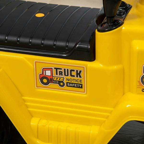 Close-up of yellow kids ride-on forklift truck side panel with Truck Notice Safety badge
