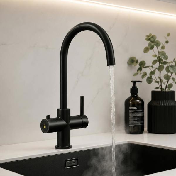 Matt black boiling water tap in a modern high end kitchen sink