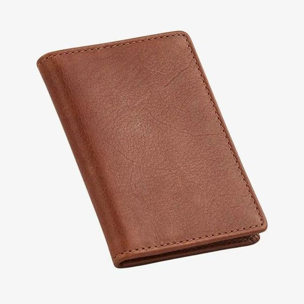 Chestnut leather card holder on a white background