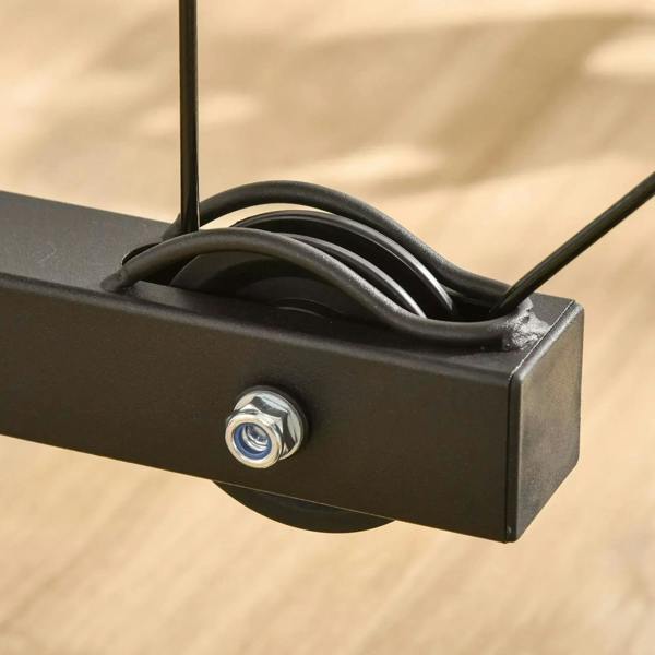 Black cable bracket with metal bolt on the power tower frame