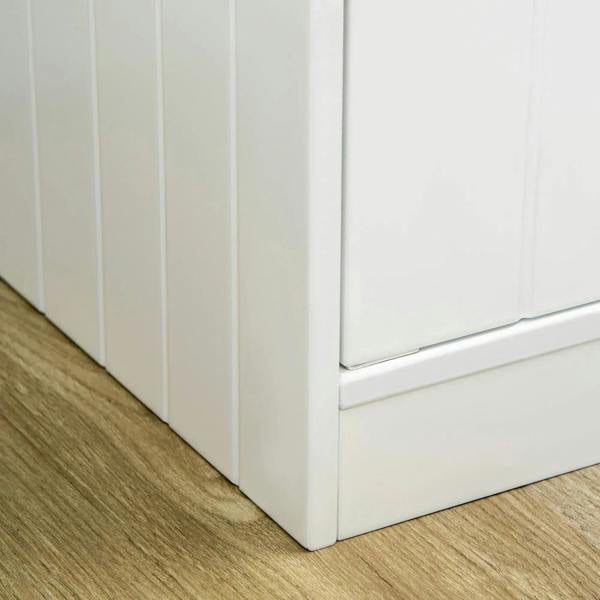 White raised pet feeder side view with paneled cabinet and base
