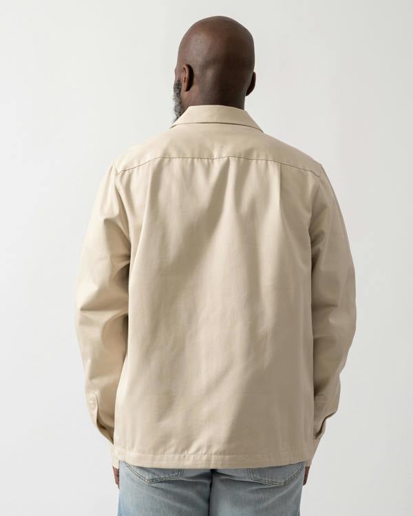 back shot of a Model wearing a Fred Perry Mens Twill Overshirt in Oatmeal