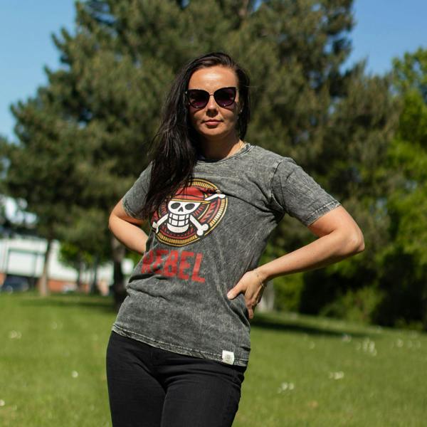 Charcoal stonewashed T-shirt on model with Rebel skull chest graphic and sunglasses