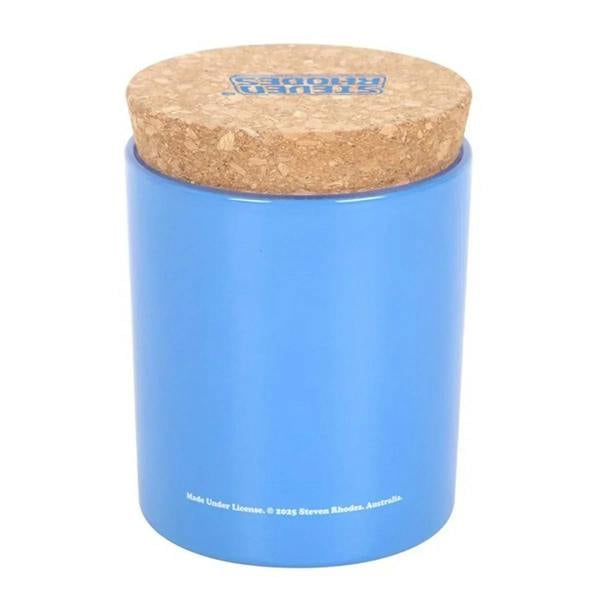 Blue candle jar with cork lid and underside text