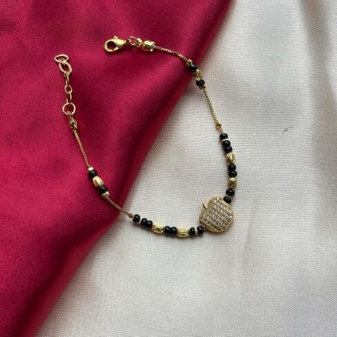 The Colourful Aura 18k Gold plated Black Bead Nazar Charm bracelet
