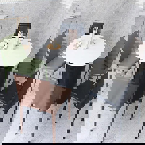 Detail view of Barbican Round Dining Table with round dining table set for 4