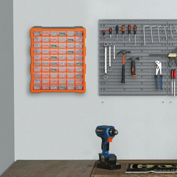 Orange drawer parts organizer cabinet with clear bins, shown on a workbench