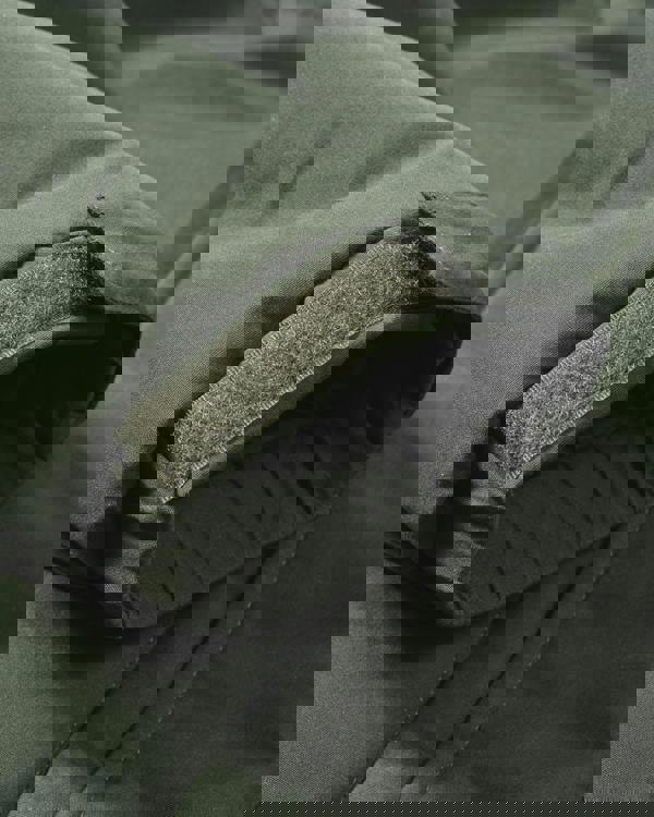 Lambretta Mens Padded Hooded Classic Badge Parka, close-up of the sleeve with a zipper and velcro fastening for extra warmth.