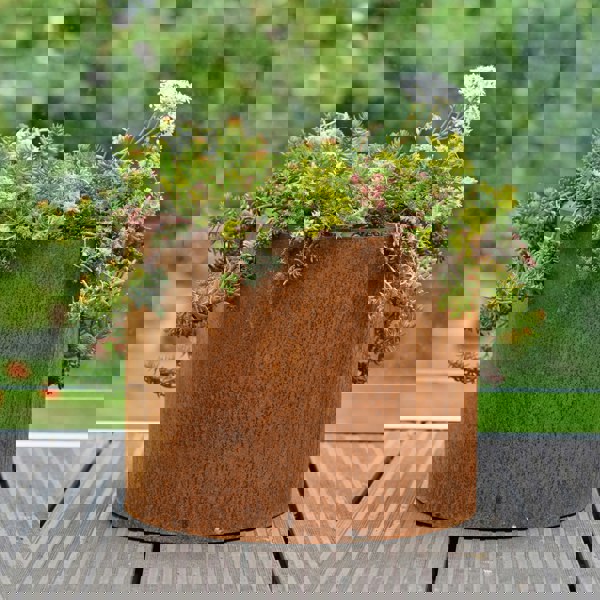 rusty metal plant pot