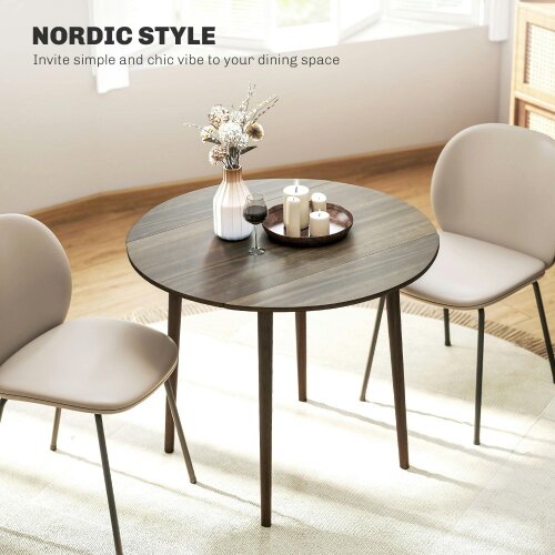 Wyld Haus Harapa Solid Wood Grey Round Folding Dining Table Seating 4 With TaFauxred Legs