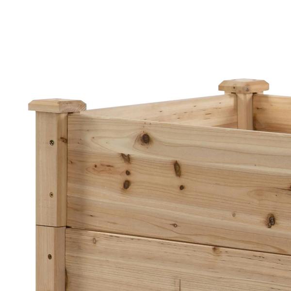 Close-up of natural wooden raised garden bed corner joint and top railing