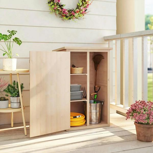 Natural wood small storage shed with open door and built-in shelves for garden items