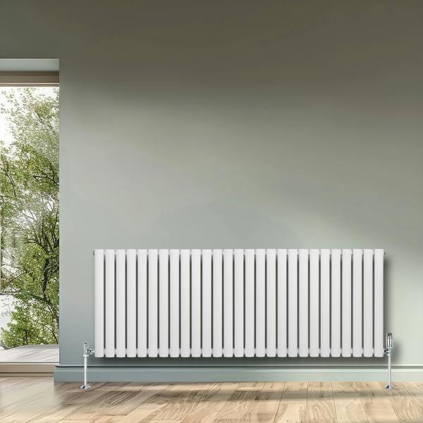 Oval single column radiator in white, measuring 600mm x 1620mm, featuring sleek vertical bars and chrome valves, set against a light wall