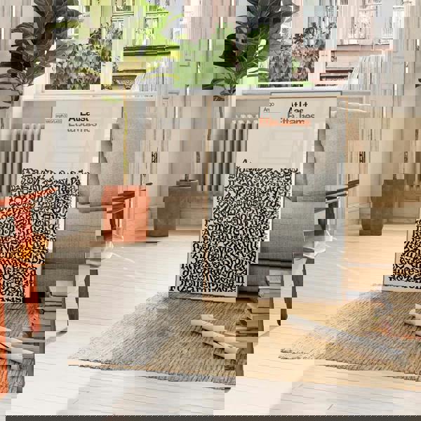 Personalised Song lyric poster of 'At Last' by Etta James in a living room setting with a plant and sofa.