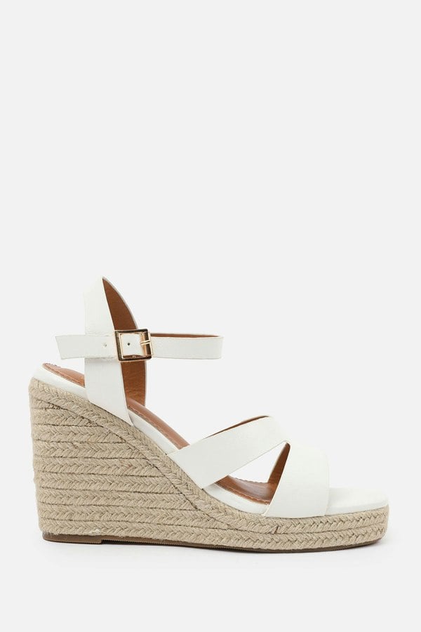 Where's That From Sansa Wide Fit Cut Out Strap Detail Wedge Shoes With Buckle Closure in White Grain Pu