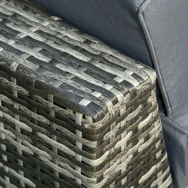 Grey woven rattan sofa arm with braided texture and dark cushion edge