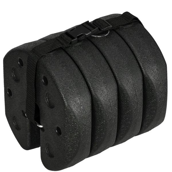Black stack of gazebo base weights strapped with carrying belt