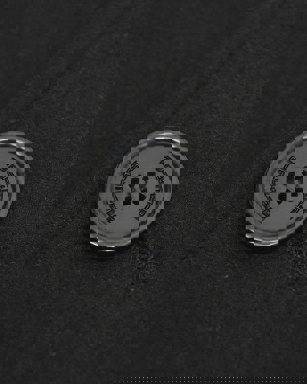 Lambretta Mens Donkey Jacket Classic MOD SKA Shoulder Panel, close-up image of a black button on the jacket.