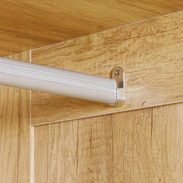 Steel hanging rail with end bracket attached to a natural wood wardrobe interior