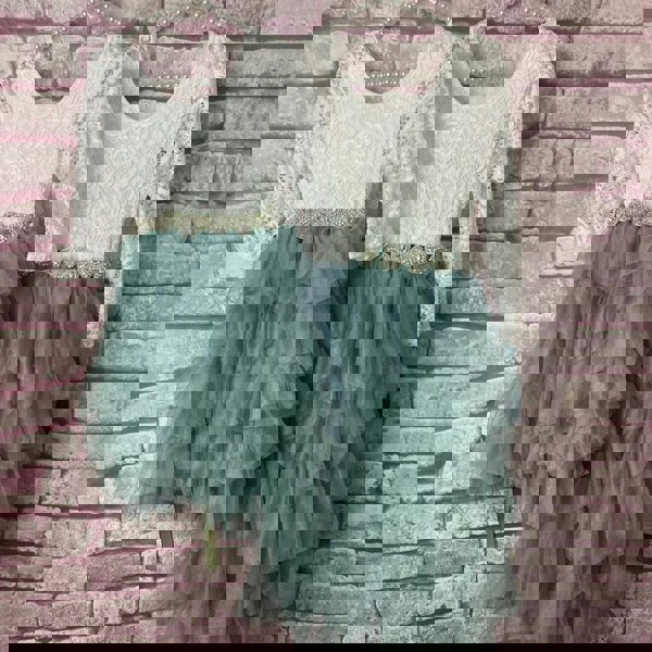 Bohemian Spirit Dresses in Sage Green on coat hangers