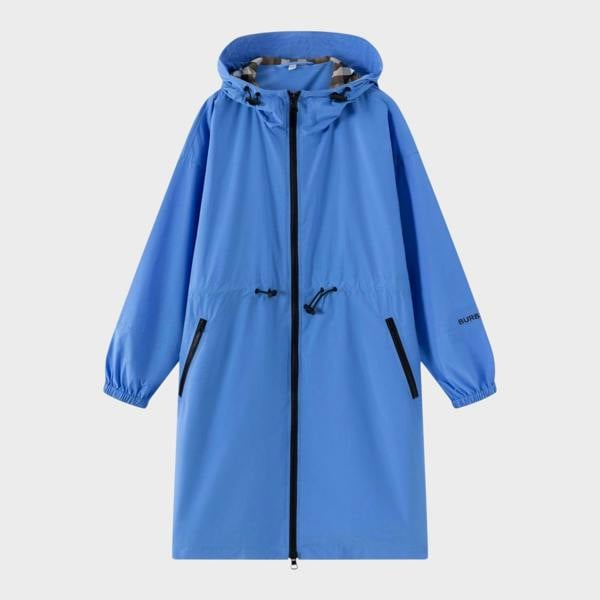 Supplied Fashion Birley long blue hooded jacket with black zip, drawstring waist, and signature check lining