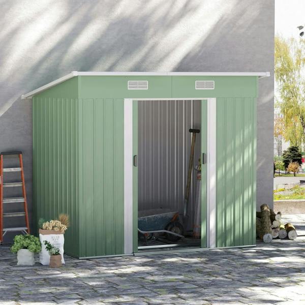 Light green metal storage shed with double sliding doors and roof air vents