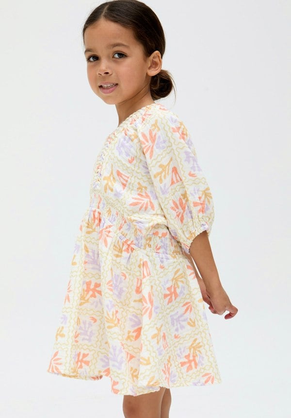model wearing Kids Soipoi Ruched V-Neck Matisse Print Dress In Multi - image 3