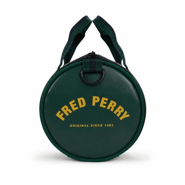 Fred Perry Classic Mini Barrel Bag in navy and grassroots green with yellow logo.