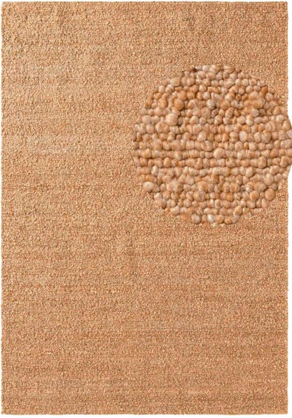 Textured beige rug with a circular pattern in the center