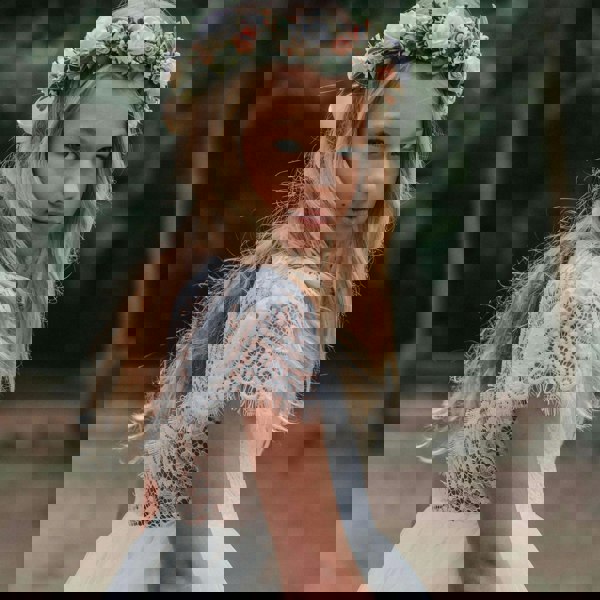 Pretty girl wearing head garland