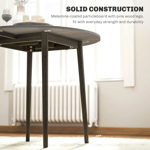 Wyld Haus Harapa Solid Wood Grey Round Folding Dining Table Seating 4 With TaFauxred Legs