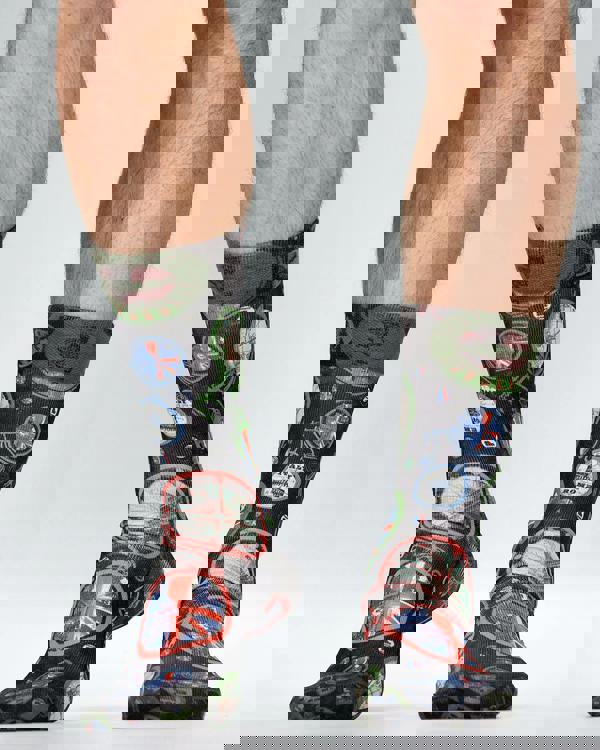 Socks with British-themed design featuring Union Jack and iconic symbols on a plain background