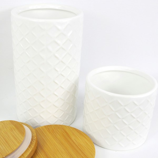 Leaf Set of Two Ceramic Jars Embossed Cream Canisters with Lids