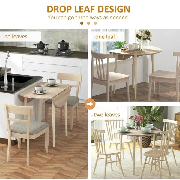 Drop-leaf round dining table with leaves folded for compact size and extended use