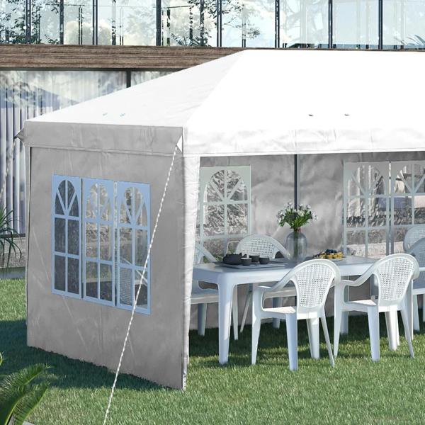 White pop-up party gazebo with sidewalls, window panels, and outdoor dining chairs