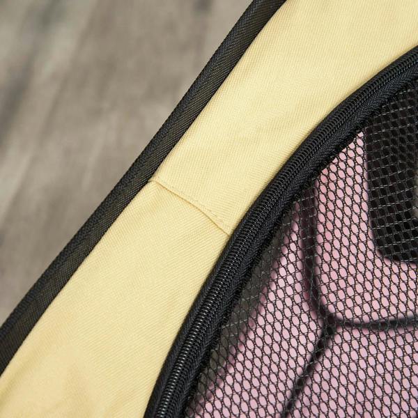 Pink and beige mesh side panel with black zipper on a fabric pet playpen
