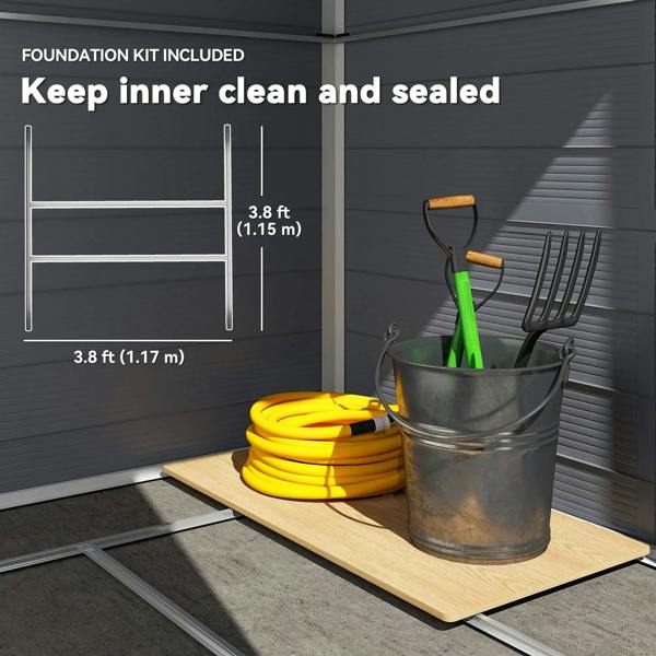 Grey shed interior with foundation base kit, storage wall panels, and tools on platform