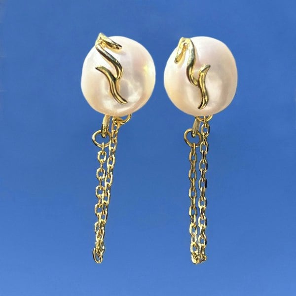 Freshwater pearl studs with looping gold chains by LENAE London.