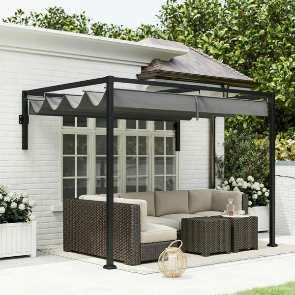 Dark grey lean-to pergola with retractable fabric canopy over patio lounge seating