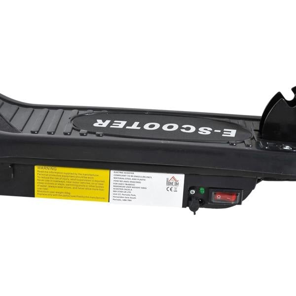 Black scooter deck with warning label and charging/control port