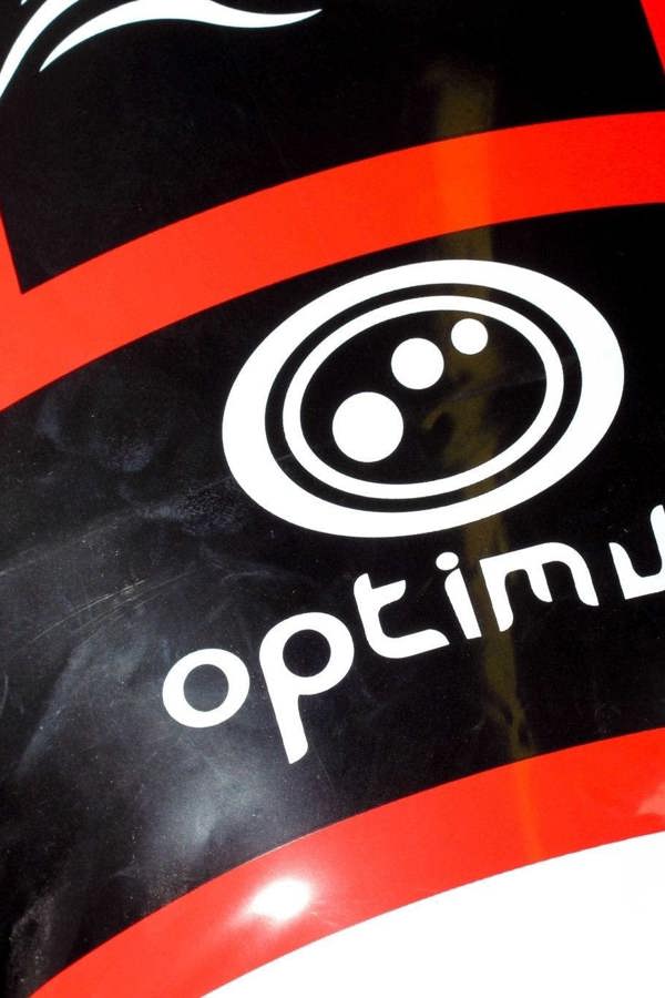 Close-up of red and black Optimum inflatable tackle buddy showing white logo print on black - Optimum